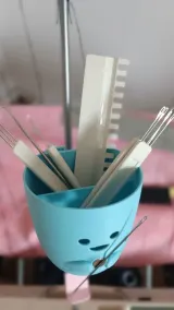Blue cat-face organizer filled with transfer tools and latch tools