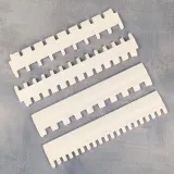 Set of 4 white needle selector rulers for 5mm knitting machines