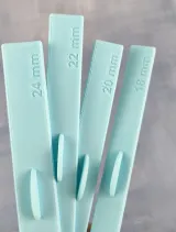 Four assembly stop rulers with engraved needle counts