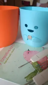 Orange and blue cat-face tool organizers