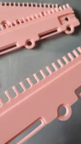 Cast-on comb segment with hanging holes for weights