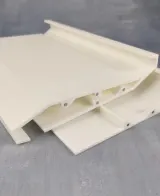 Lower front needle bed cover segments, side profile