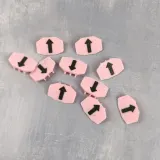 Pink needle markers with black arrows