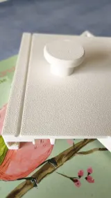 Close-up of the unraveling carriage handle and smooth base