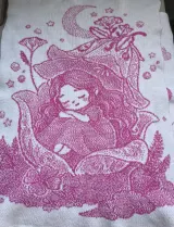 Pink and white jacquard baby blanket with the sleeping fairy design