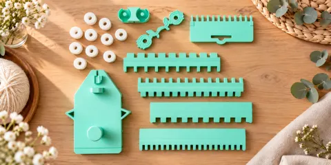 Mint 3D-printed machine knitting tools: needle selectors, cast-on comb, carriage and wax holders